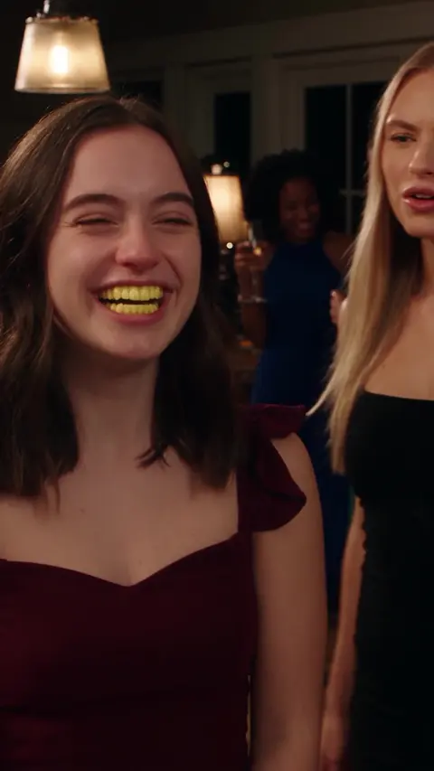 Real Pinnora output: UGC-style still of two friends laughing at a party